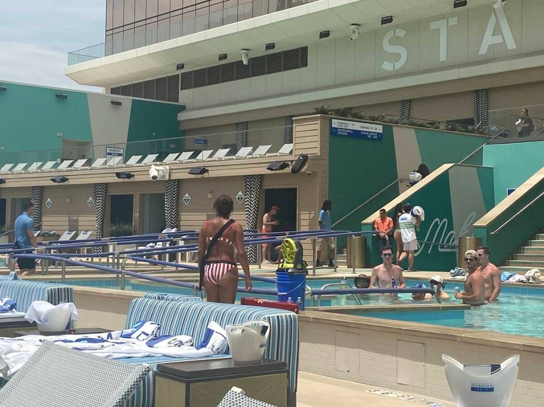 A lifeguard watches over pool-goers at Circa Resort's Stadium Swim on July 22, 2022. Lifeguards ...