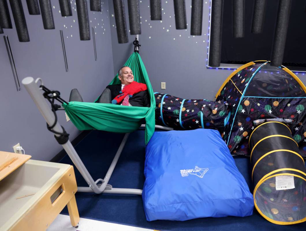 Clark County School District Superintendent Jesus Jara rests in a hammock in the Zen Den at Dun ...