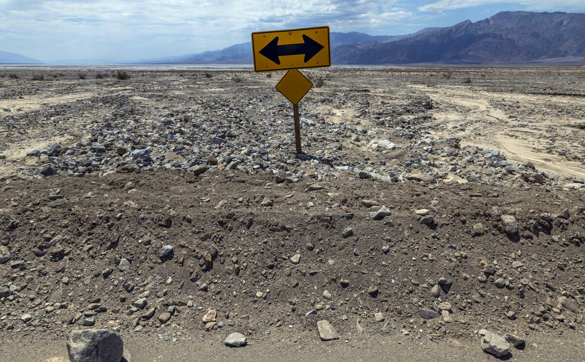 Dirt is piled high along State Road 190 near Beatty Road which is temporarily closed due to the ...