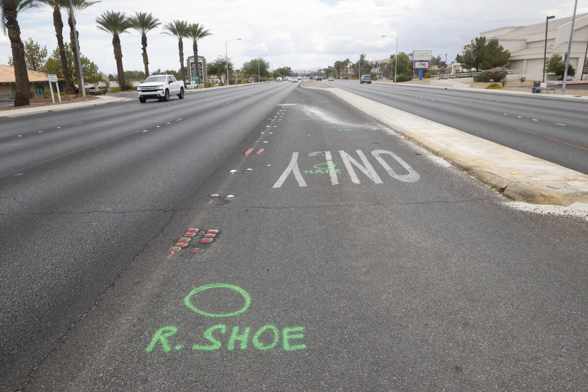 The site of a fatal crash is seen at South Rainbow Boulevard and Palmyra Avenue, Tuesday, Aug. ...