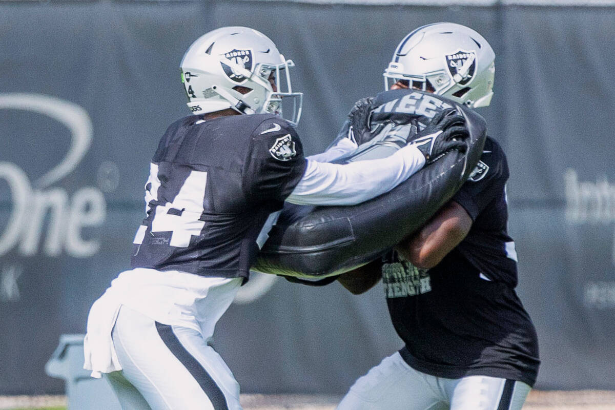 Raiders safety Johnathan Abram (24) drills with safety Duron Harmon (30) during the team&#x2019 ...