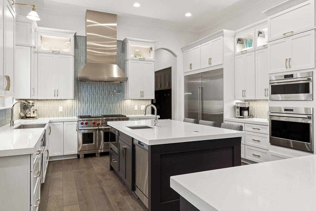 The kitchen features two islands. (Ivan Sher Group)