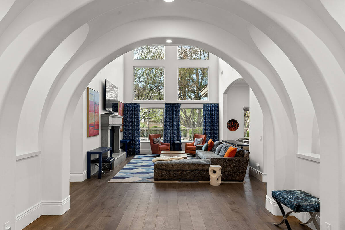 The arched formal dining room with wine cellar. (Ivan Sher Group)