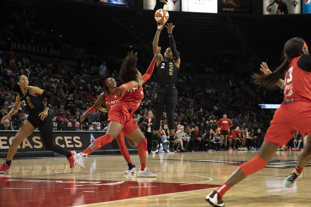 Las Vegas Aces guard Riquna Williams (2) shoots against Atlanta Dream forward Cheyenne Parker ( ...