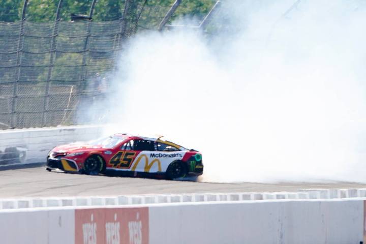 Kurt Busch (45) spins as he takes part in qualifying for the NASCAR Cup Series at Pocono Racewa ...