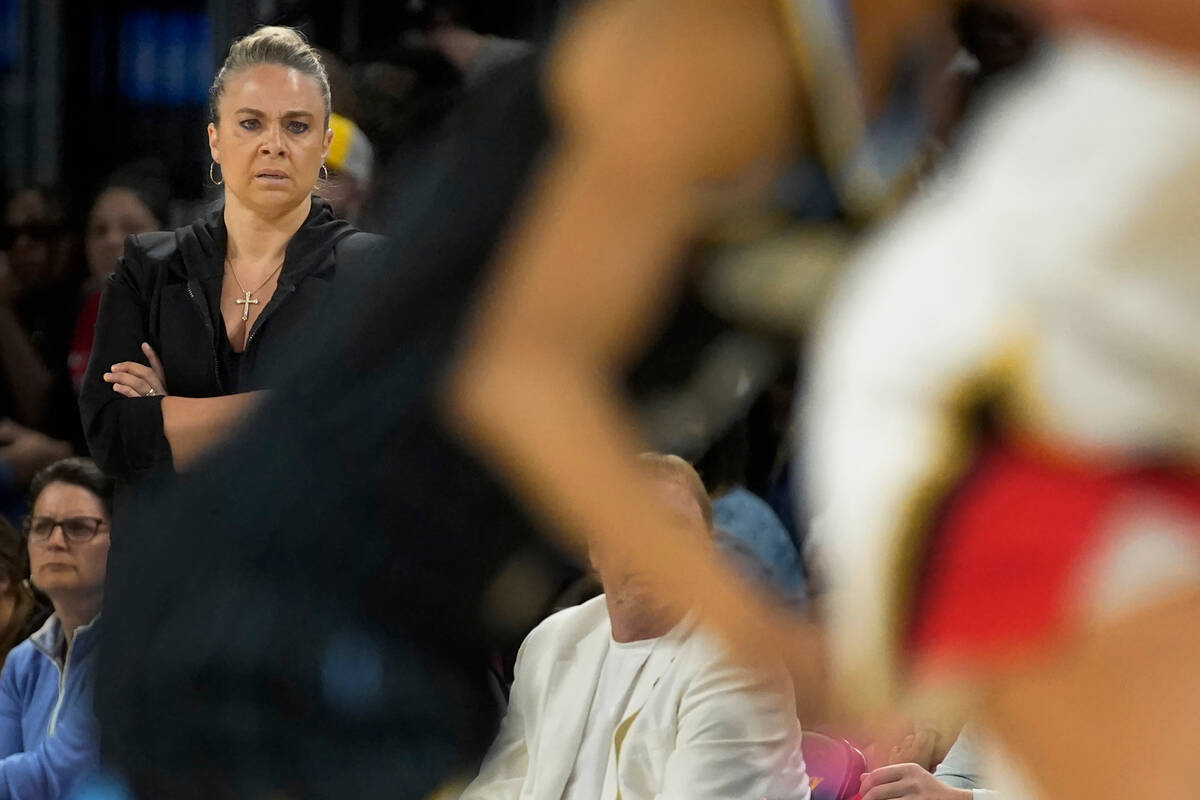 Las Vegas Aces head coach Becky Hammon watches her team play the Chicago Sky during the WNBA Co ...
