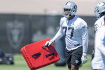 Raiders offensive tackle Thayer Munford (77) prepares to drill during the team’s mandato ...