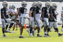 Raiders defensive linemen, from left, Neil Farrell Jr. (93), Malcolm Koonce (51), Kendal Vicker ...