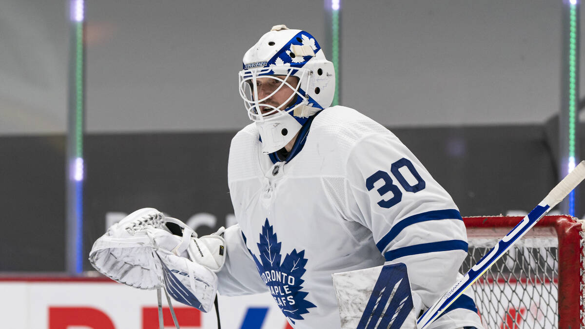 Toronto Maple Leafs goaltender Michael Hutchinson (30) readies to make a save during an NHL hoc ...