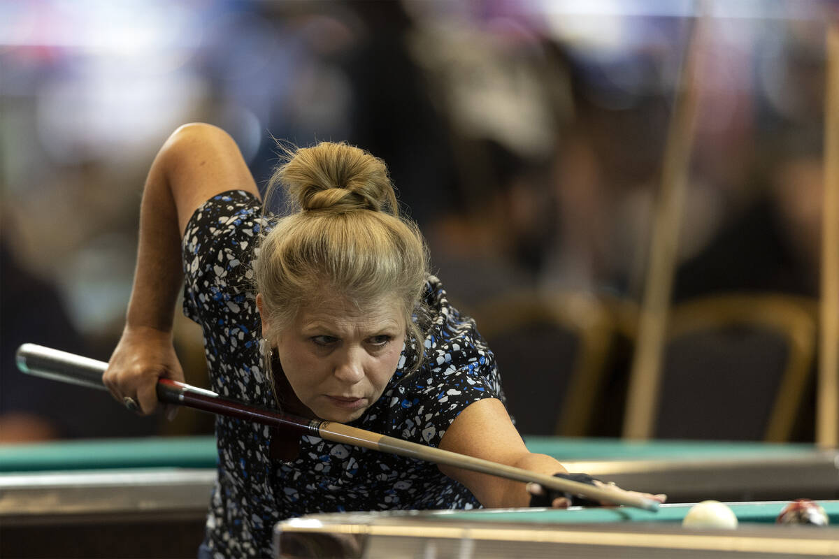 Gemma Pratt, of Canada, eyes her shot during the American Poolplayers Association World Pool Ch ...