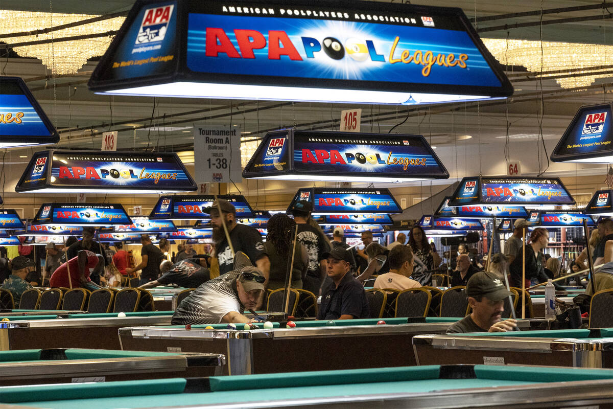 Competitors play during the American Poolplayers Association World Pool Championships at Westga ...