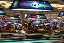 Competitors play during the American Poolplayers Association World Pool Championships at Westga ...