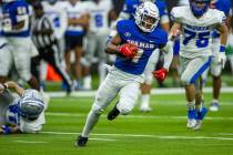 Bishop Gorman wide receiver Zachariah Branch (1) cuts into the open for another score over McQu ...