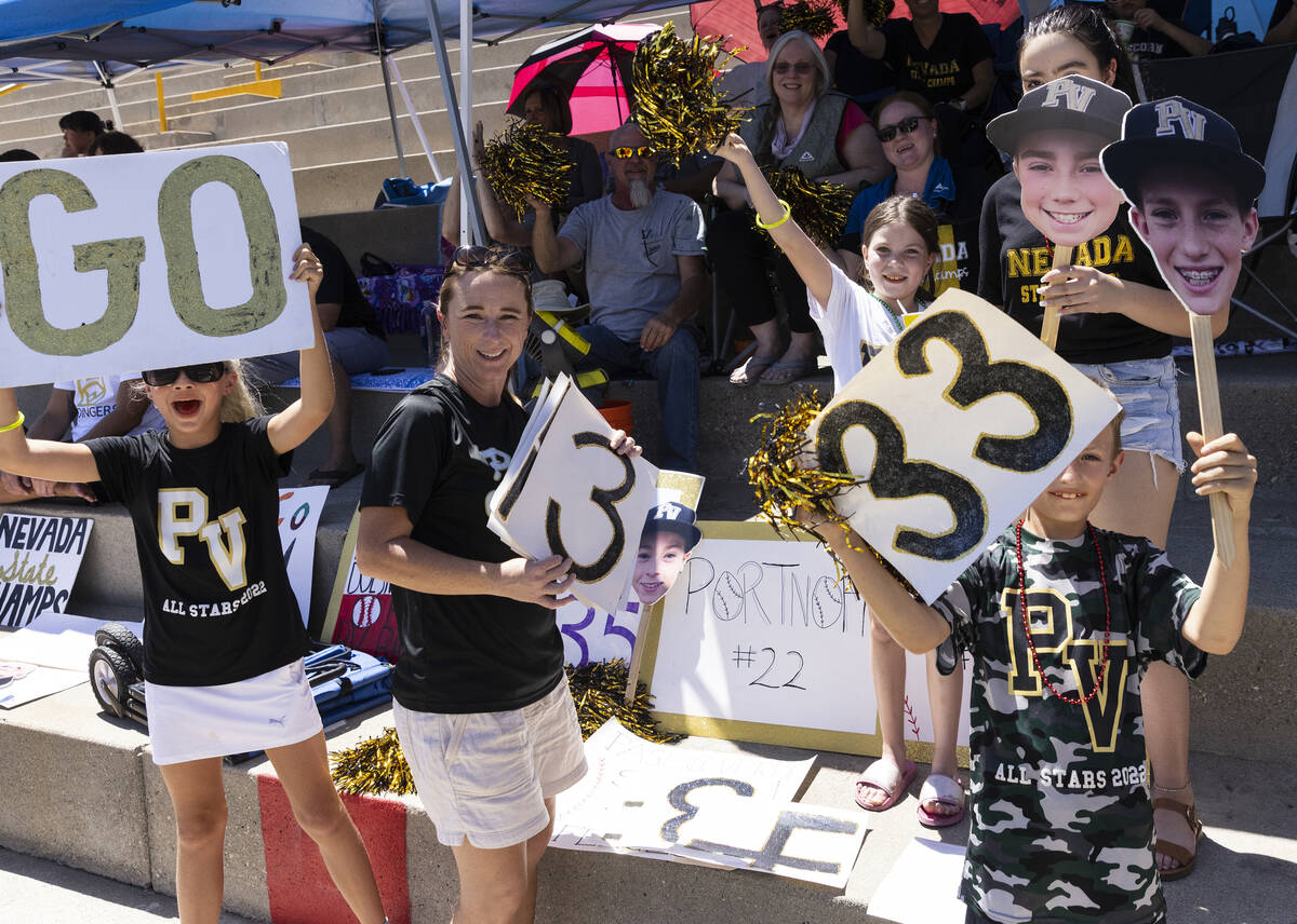 Paseo Verde fans, including Taylor Schmitt, 9, left, Brooklynn Portnoff, 8, second right, and L ...