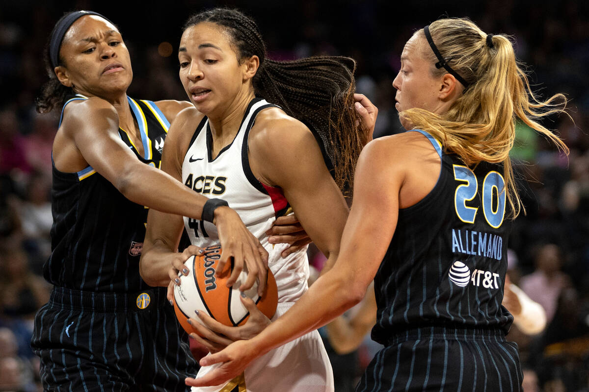 Las Vegas Aces center Kiah Stokes (41) fights for possession with Chicago Sky forward Azura Ste ...