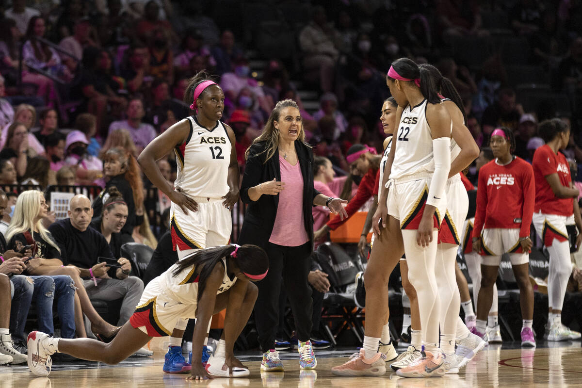 Las Vegas Aces head coach Becky Hammon speaks to her team in a timeout during the second half o ...