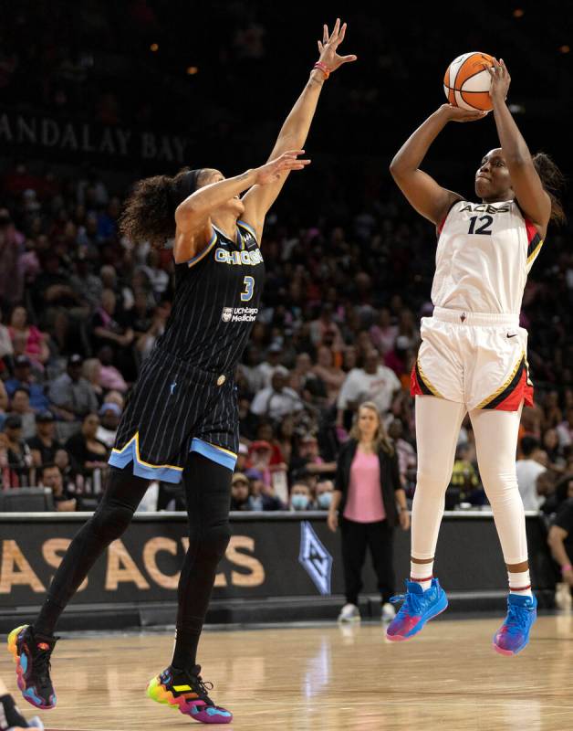 Las Vegas Aces guard Chelsea Gray (12) shoots against Chicago Sky forward Candace Parker (3) du ...