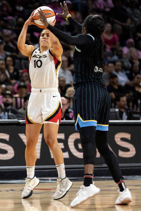Las Vegas Aces guard Kelsey Plum (10) shoots against Chicago Sky guard Kahleah Copper (2) durin ...