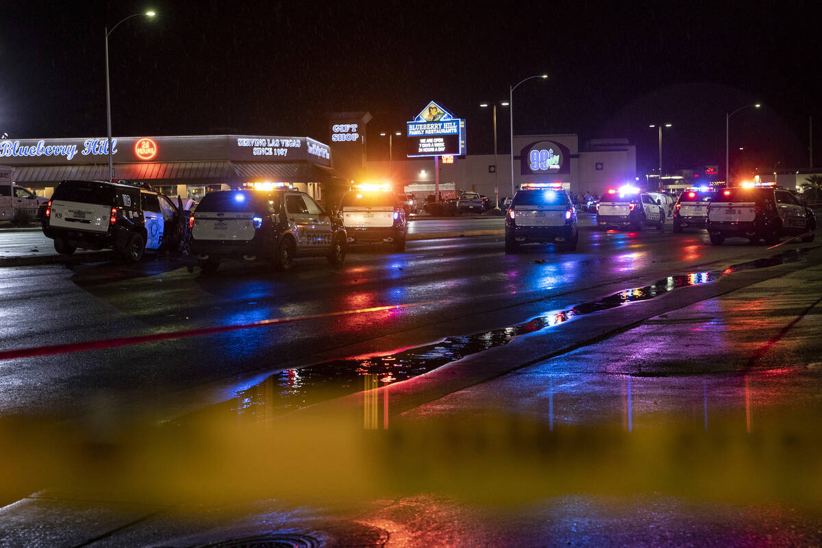 Metropolitan police respond to a scene at South Decatur Boulevard near Charleston Boulevard, wh ...