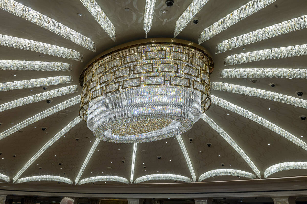 Caesars unveils its renovated casino dome with chandelier centerpiece within a main gaming area ...