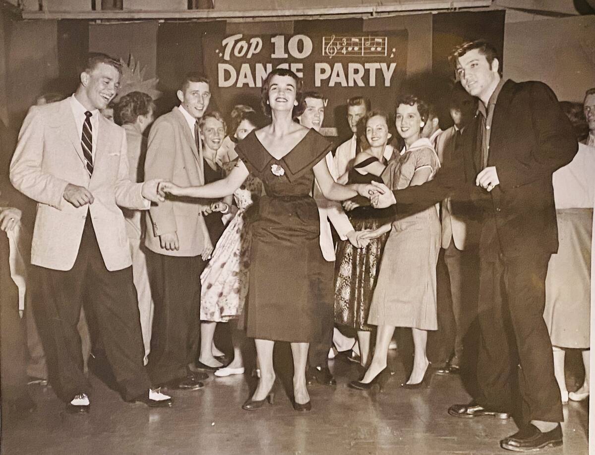 Wink Martindale, far left, and Elvis Presley are shown on Martindale's show "Teen Dance Party" ...