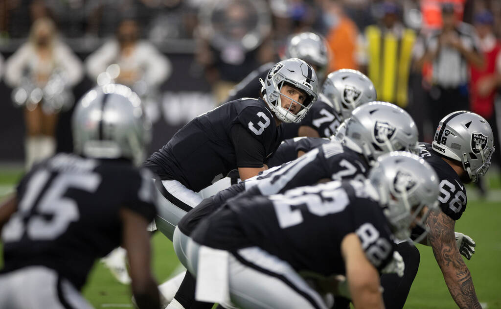 Raiders quarterback Nathan Peterman (3) runs the offense in the first quarter during an NFL pre ...