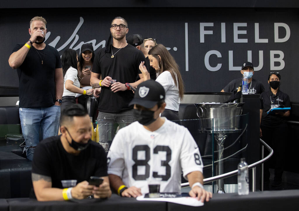Fans enjoy the Wynn Field Club during an NFL preseason football game between the Raiders and th ...