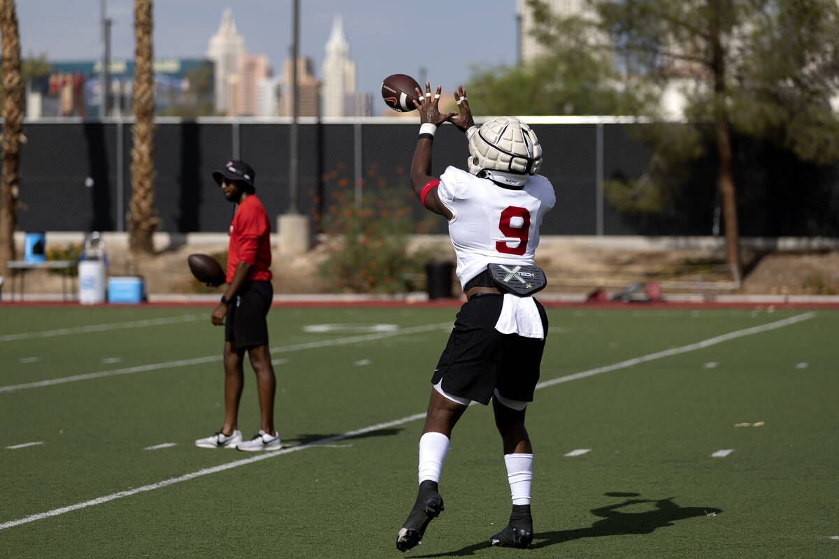 UNLV Rebels running back Aidan Robbins (9) reaches to catch during a team football practice at ...