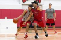 UNLV's Justin Webster (2) defends against Jordan McCabe (5) during a team basketball practice a ...