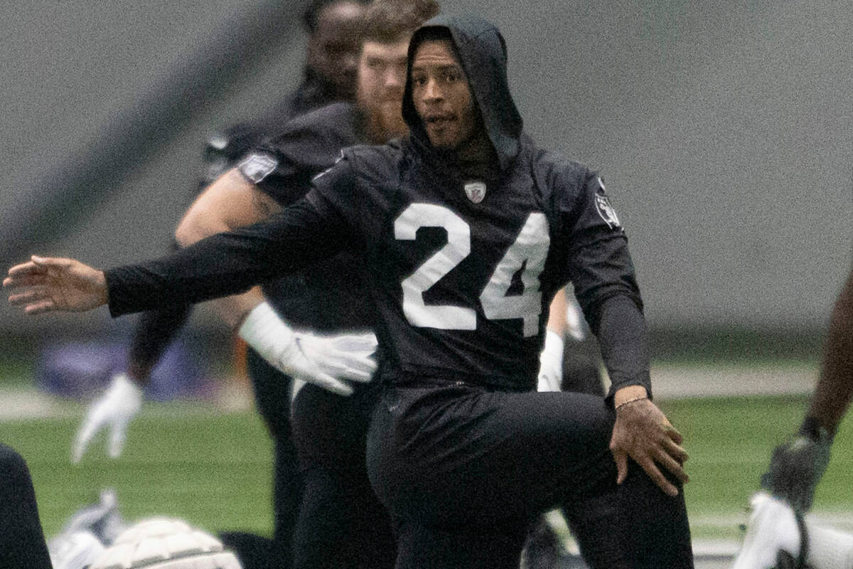 Raiders safety Johnathan Abram (24) stretches during the team’s training camp practice a ...