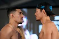 Pedro Campa, right, and Teofimo Lopez pose during a weigh-in for their junior welterweight boxi ...