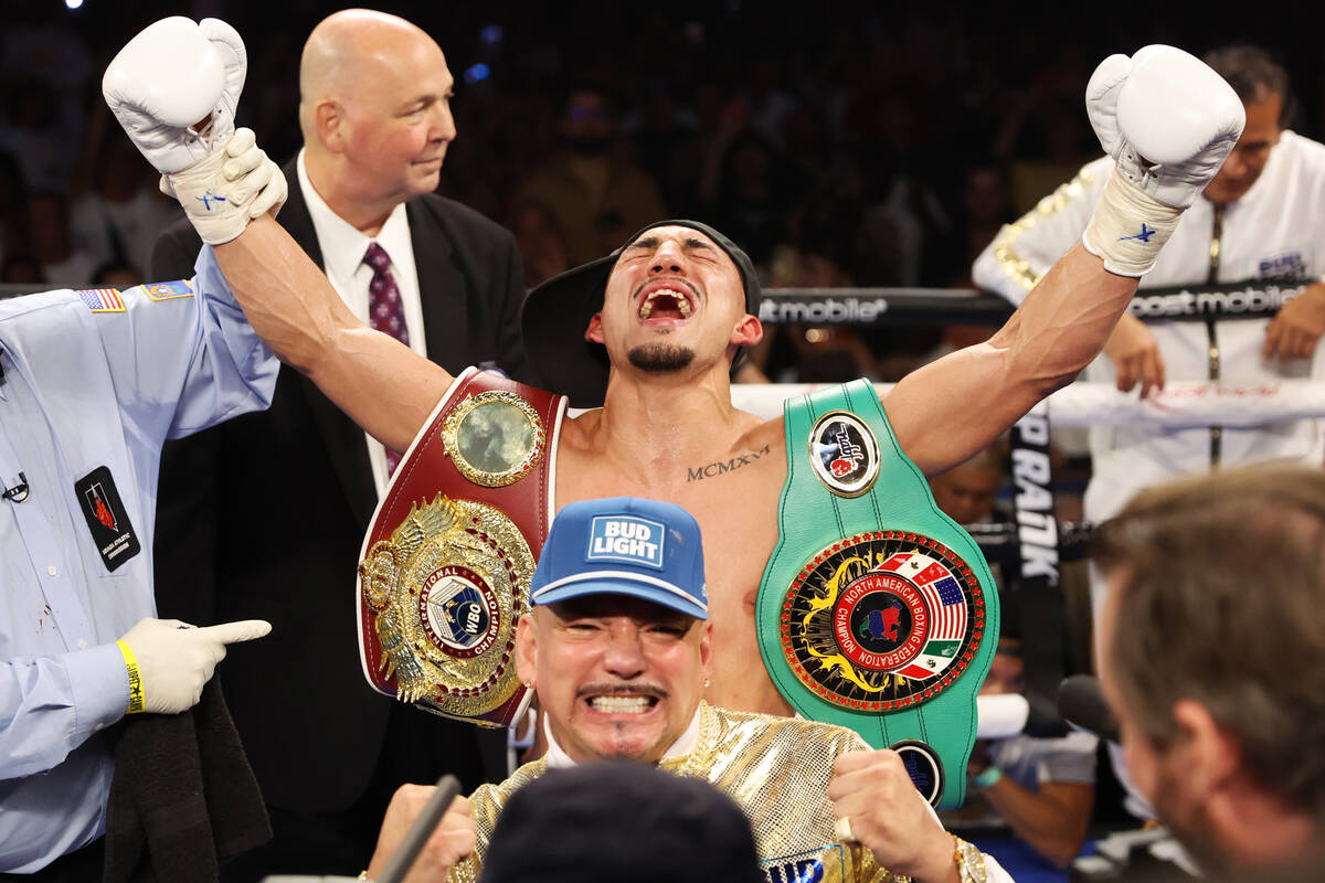 Teofino Lopez celebrates his technical knockout victory against Pedro Campa in the seventh roun ...