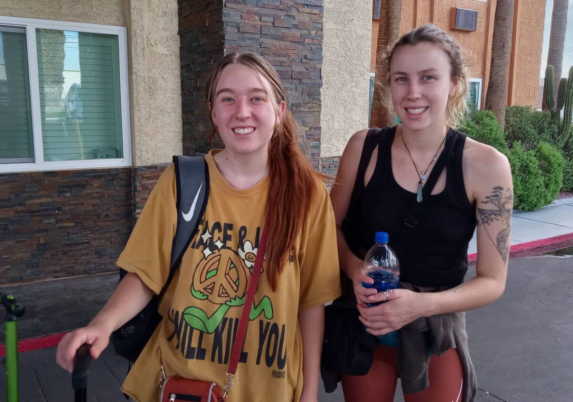 Sisters from New Zealand, Cinamin, left, and Sapphire Collins decided to delay their flight to ...