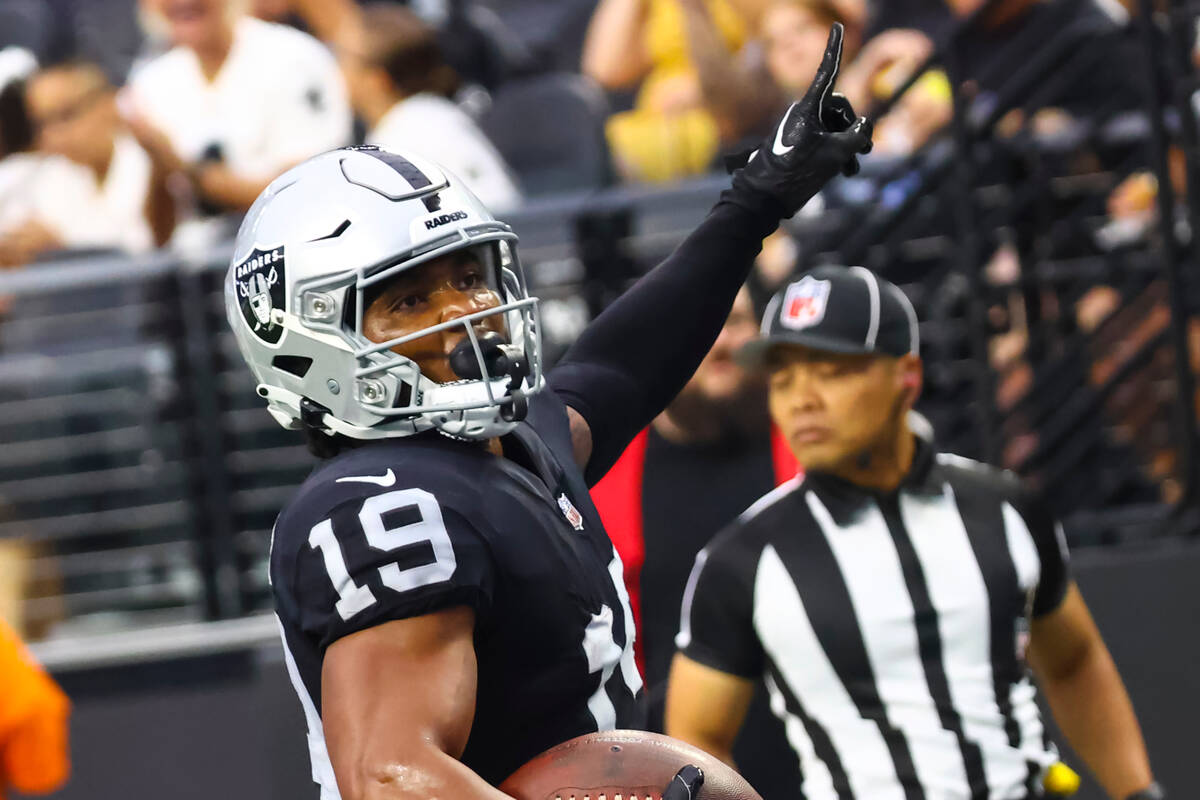 Raiders wide receiver DJ Turner (19) scores a touchdown against the Minnesota Vikings during th ...