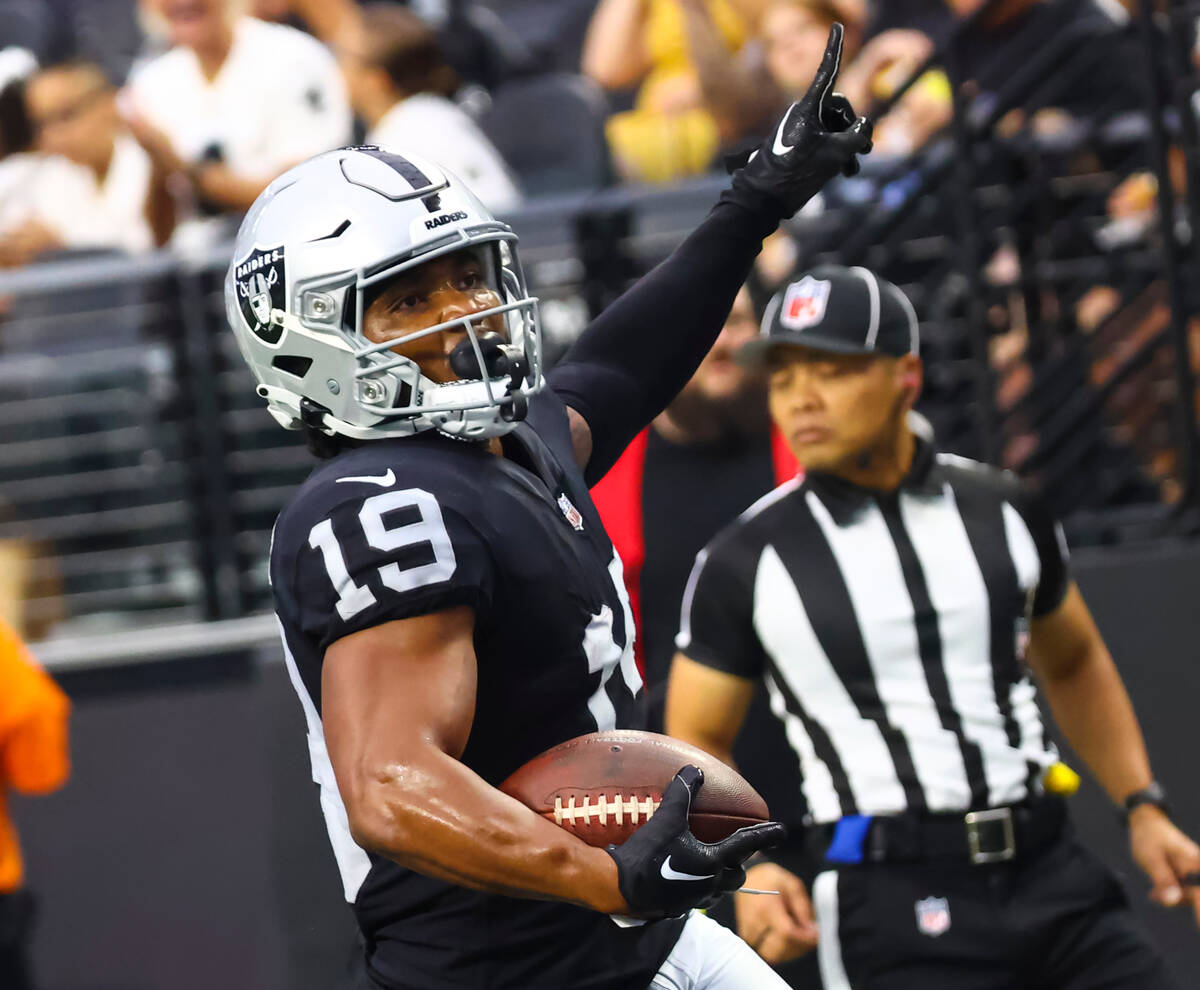 Raiders wide receiver DJ Turner (19) scores a touchdown against the Minnesota Vikings during th ...