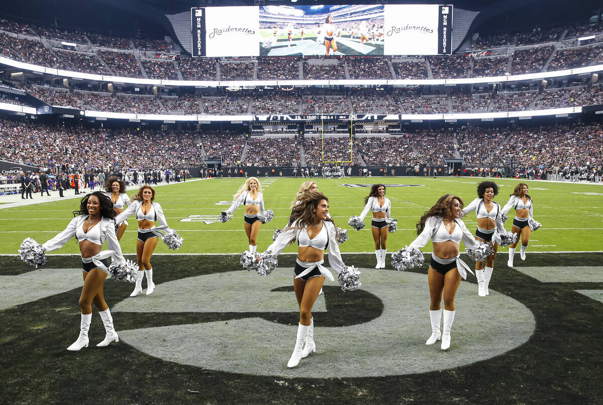 The Raiderettes perform during the first half of an NFL preseason football game on Sunday, Aug. ...