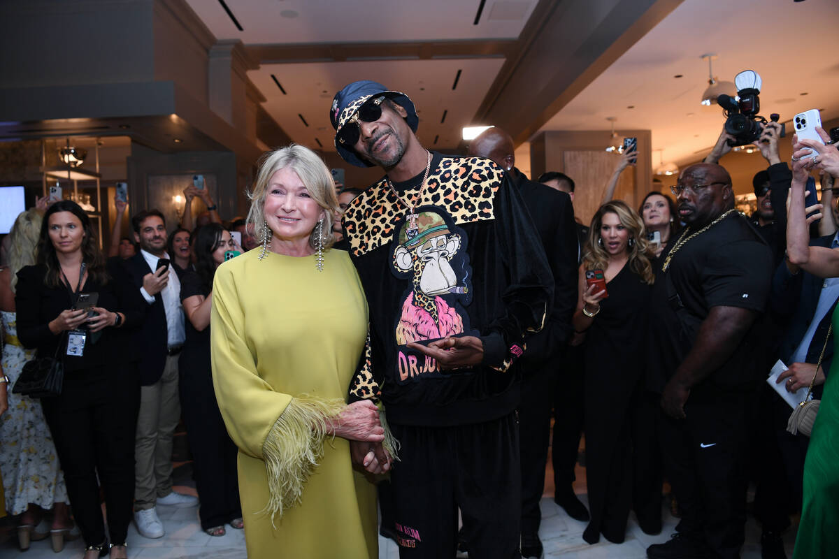 Martha Stewart, left, and Snoop Dogg party it up at the opening of The Bedford at Paris Las Veg ...