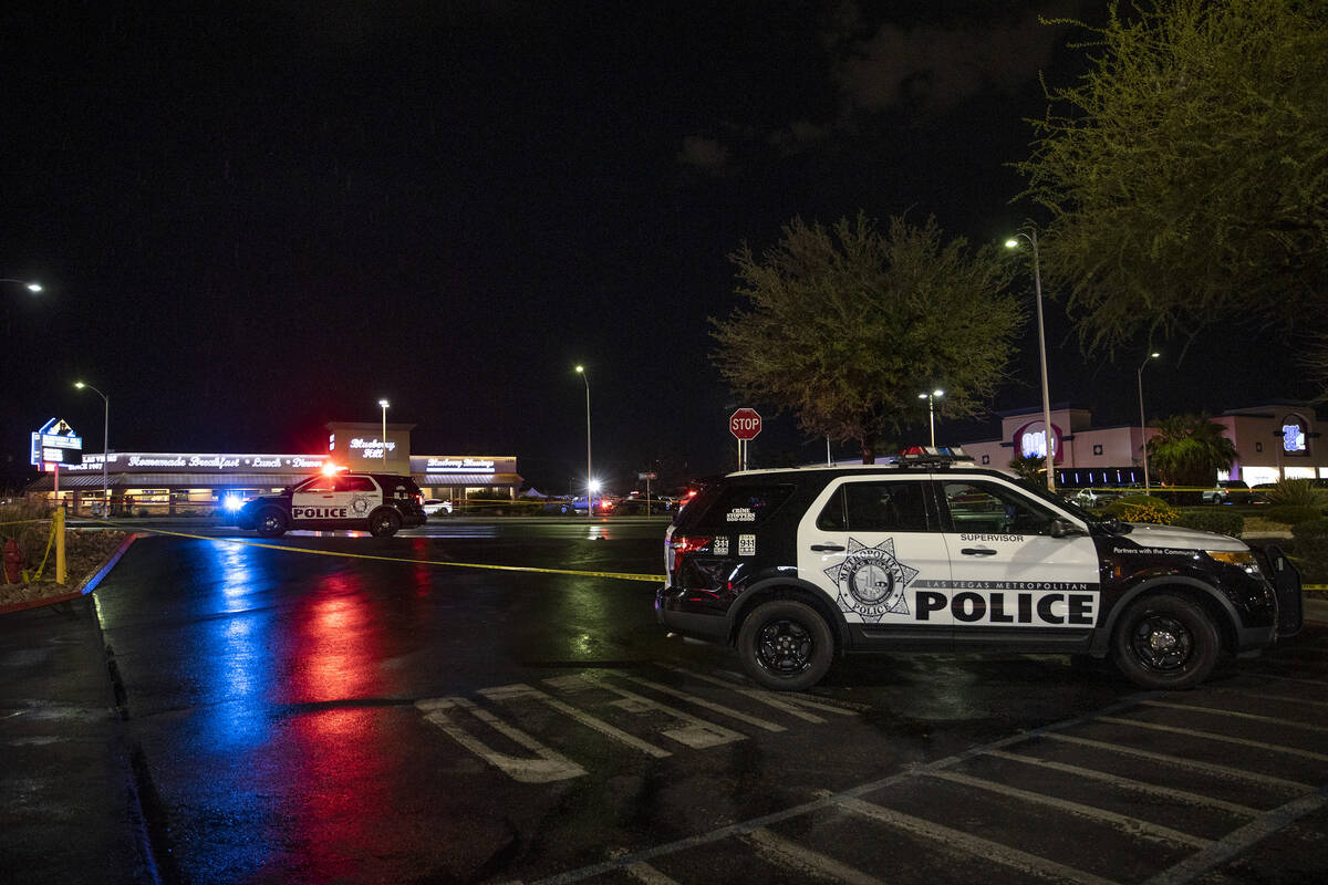 Metropolitan police respond to a scene at South Decatur Boulevard near Charleston Boulevard, wh ...