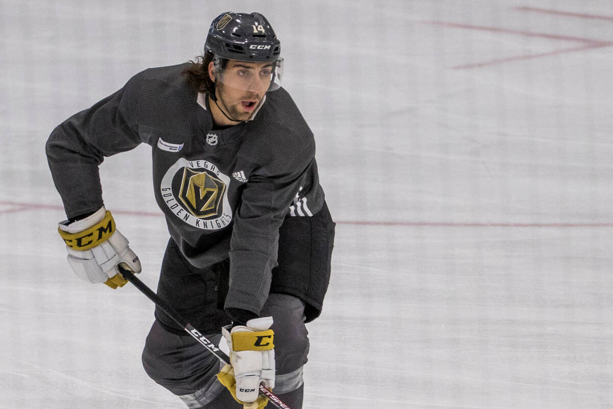 Vegas Golden Knights defenseman Nic Hague handles the puck during practice at City National Are ...