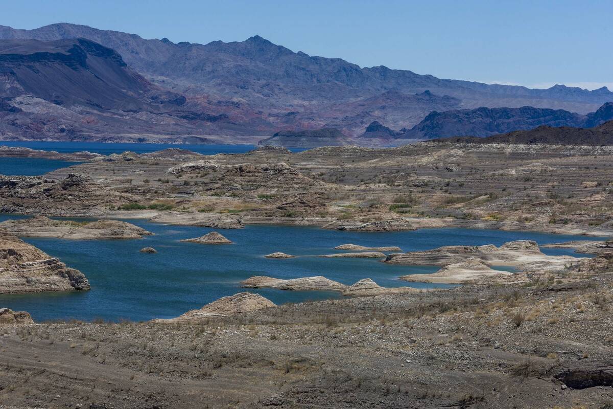 Water continues to recede along the shoreline of Lake Mead seen from the Sunset View Scenic Ove ...