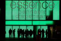 In this March 17, 2020, file photo, people line up at Essence cannabis dispensary on Las Vegas ...