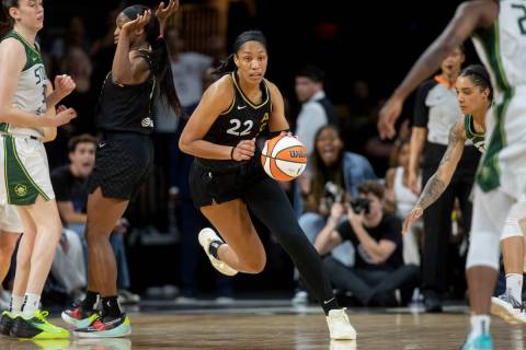 Las Vegas Aces forward A'ja Wilson (22) brings the ball up the court as the Aces face the Seatt ...