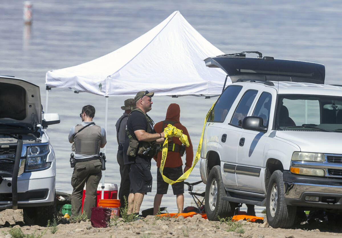 Authorities begin to break down the site while assessing what were described as skeletal remain ...