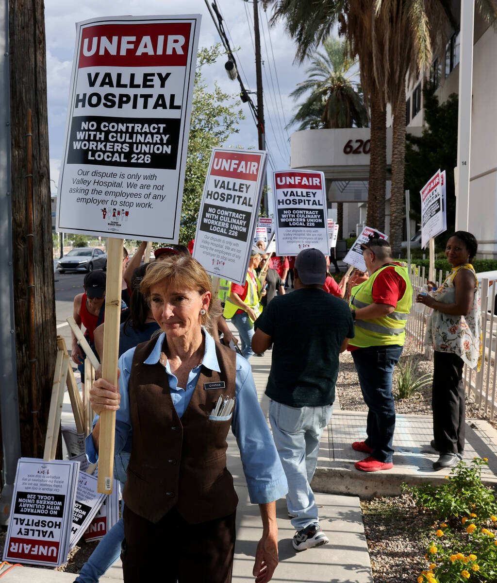 Members of the Culinary Union and supporters picket Valley Hospital Medical Center in Las Vegas ...