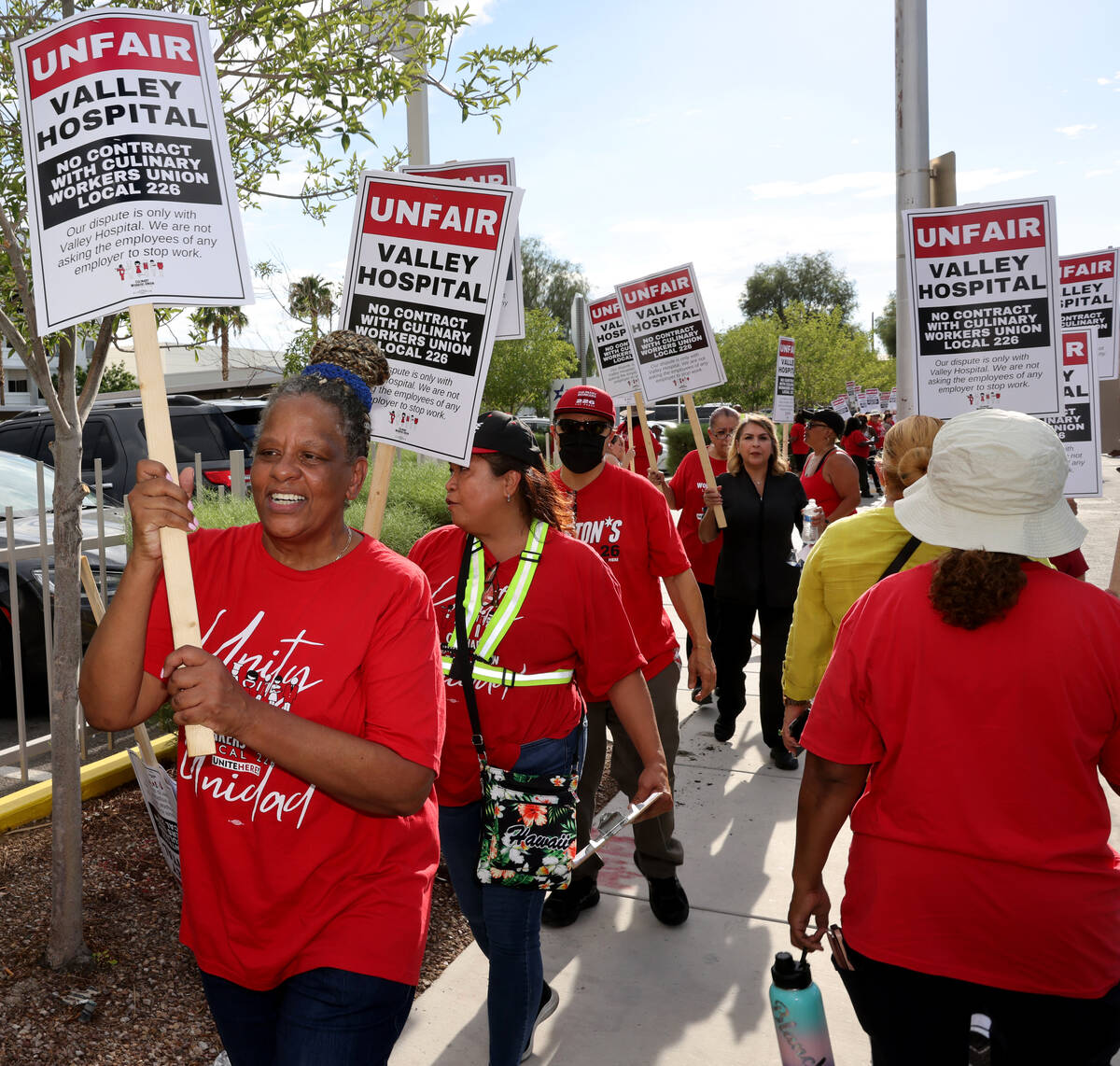 Members of the Culinary Union, including 40-year employee Betty Williams, left, and supporters ...