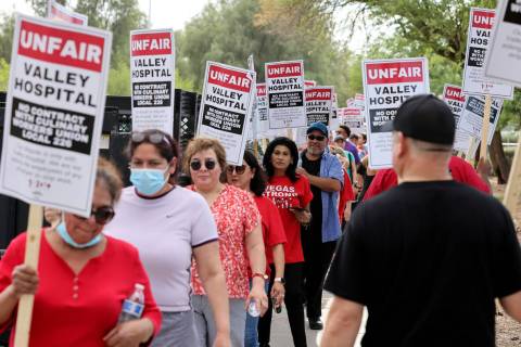 Members of the Culinary Union and supporters picket Valley Hospital Medical Center in Las Vegas ...