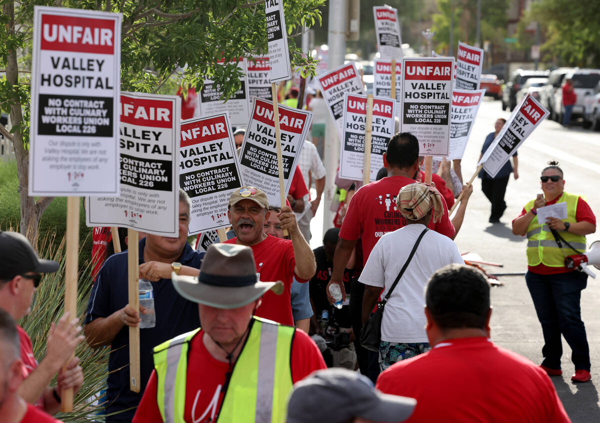 Members of the Culinary Union and supporters picket Valley Hospital Medical Center in Las Vegas ...