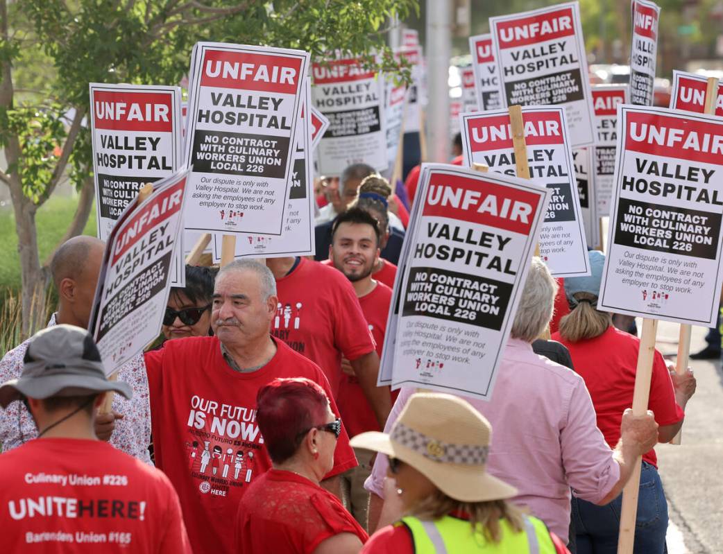 Members of the Culinary Union and supporters picket Valley Hospital Medical Center in Las Vegas ...