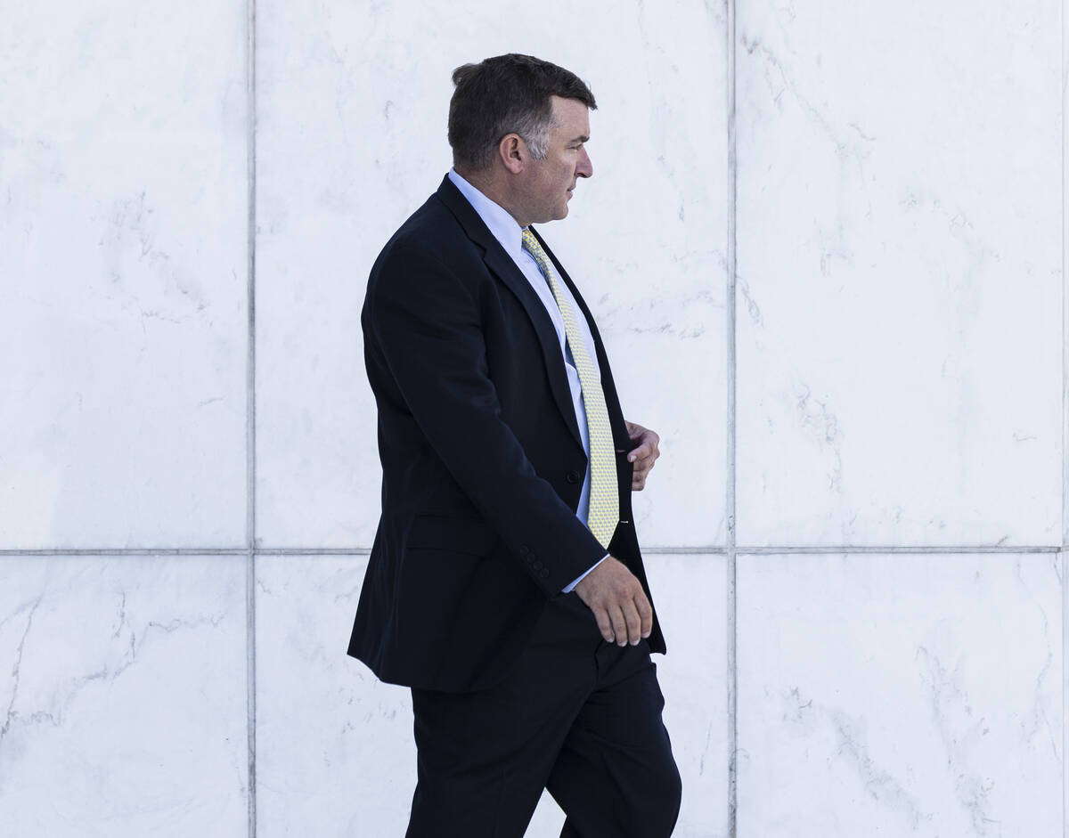 FBI agent Scott Carpenter, 40, leaves the Lloyd George U.S. Courthouse after his sentencing on ...