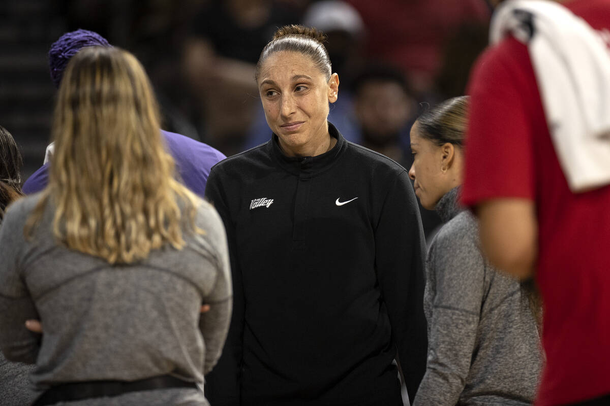 Phoenix Mercury guard Diana Taurasi, who didn’t play in the game, speaks with coaching s ...